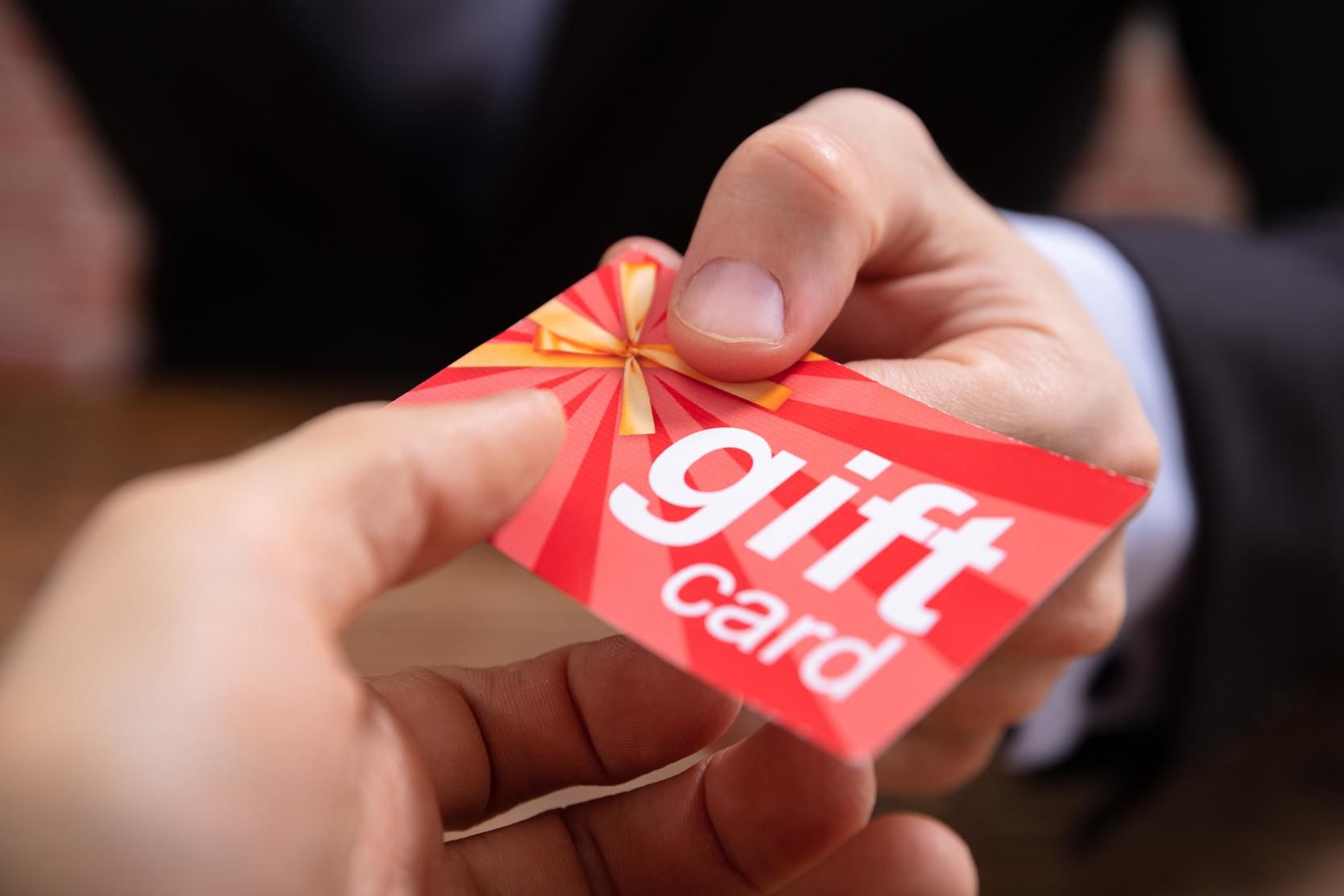 Gift card held in hand