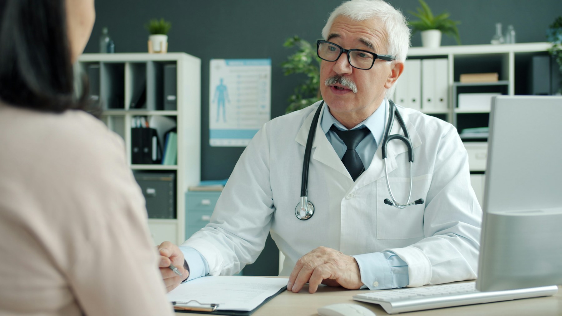Doctor discussing a weight-management care plan with a patient
